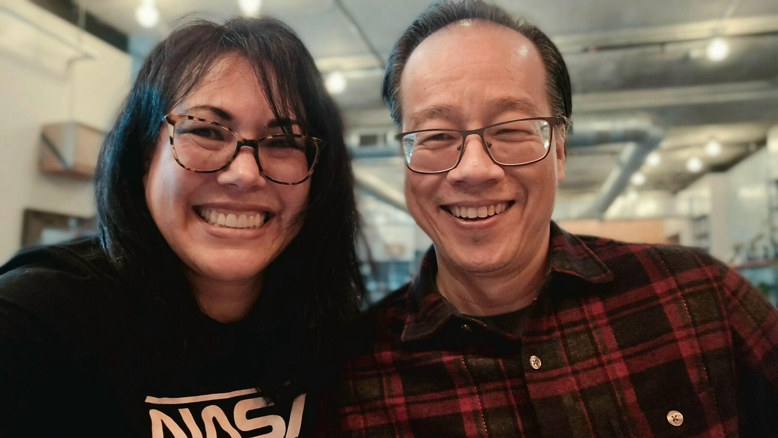 Natalie Luke and Viet Nguyen smiling together at HUSHY during the lunch where Volume Control and 3rd Space Project began.